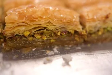 Traditional Turkish dessert Baklava with honey and pistachios