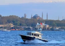 Boat on the Bosphorus with Istanbul Skyline
