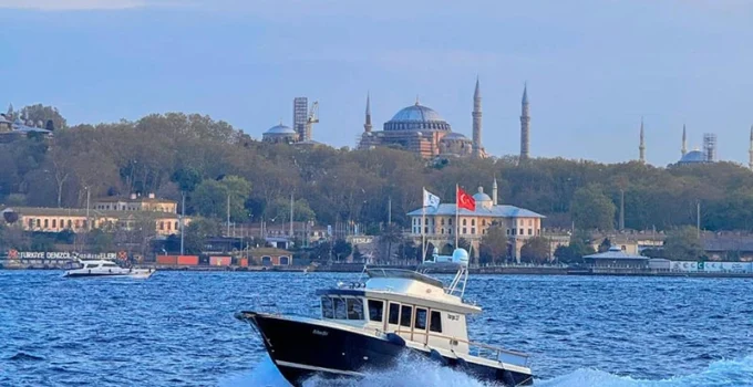 Boat on the Bosphorus with Istanbul Skyline
