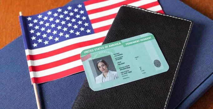 Top view of Green Card, passport, and visa documents
